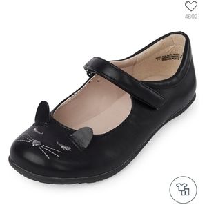 Girl uniform black shoes.